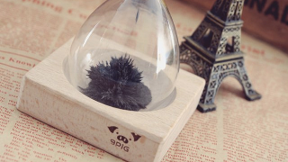 Illustration for article titled Kill Time By Creating Art With an Hourglass Full of Magnetic Sand